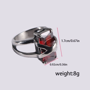 Detail view of silver cross ring with red ruby dimensions 1.7cm by 0.92cm weighing 8g