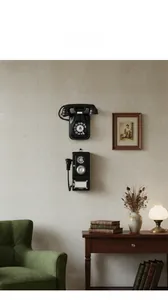 Detail view of a vintage black wall-mounted rotary telephone in a retro bar decor setting