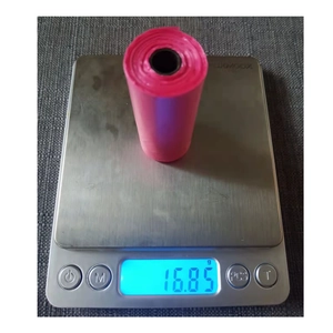Detailed weight measurement showing 16.85g for one roll of rose red biodegradable pet waste bag