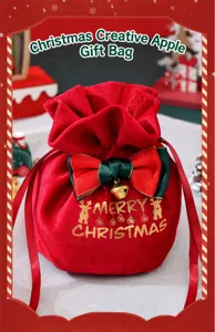 Détail du sac cadeau de Noël en velours rouge avec élan doré et nœud de ruban à cloche
