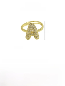 Detail of gold letter A balloon ring with white zircon pave setting and 15mm height