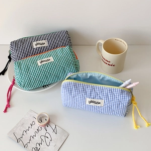 Quilted plaid stationery storage bag with zipper and lanyard in blue green and black colors