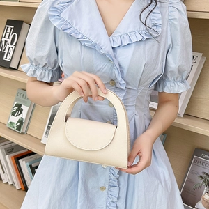 Chic off-white lychee texture leather mini handbag with arched handle for women