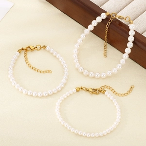 Three-piece vintage white pearl bracelet set with golden stainless steel clasp for women