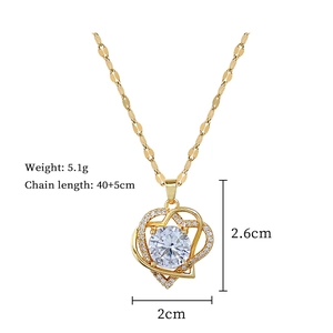 Detailed view of gold heart pendant necklace with size dimensions and cz crystal weight