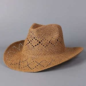 Close-up of the breathable hollow-weave texture on this brown straw cowboy sun hat