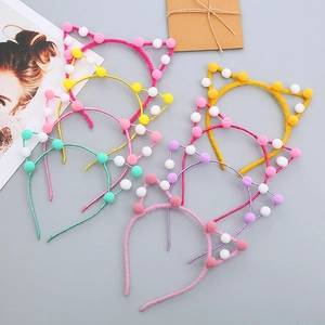 Cute kids cat ear headbands with colorful pom poms and soft fabric wrap in multiple colors