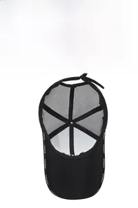 Detail of breathable black trucker hat mesh and internal VESPORTS brand webbing