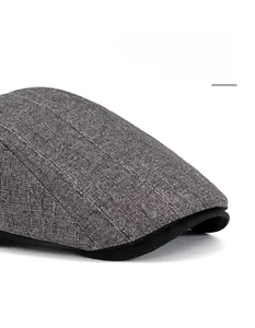 Detail of grey striped fabric texture and black trim on a classic adjustable flat cap