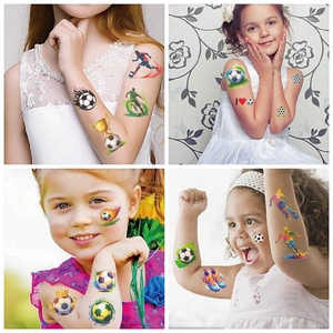 Waterproof temporary soccer tattoos for kids featuring balls, trophies and players