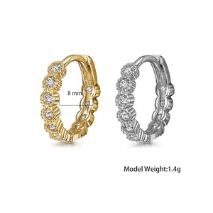 Detailed view of 8mm inner diameter silver ear hoops with full pavé cubic zirconia