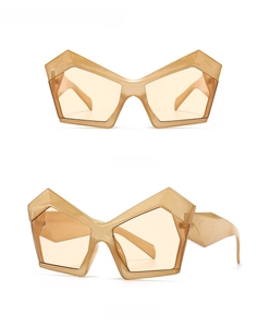 Front and 45-degree side views of tan oversized geometric thick frame sunglasses