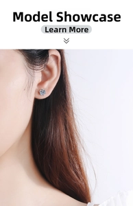 Close-up of model wearing classic six-prong moissanite stud earring in s925 silver