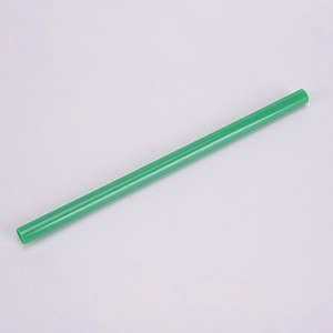 Detailed view of a bright green reusable Tritan straw with a smooth polished finish