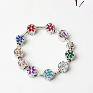 DIY silver bracelet with flower pattern colorful rhinestone beads on white background
