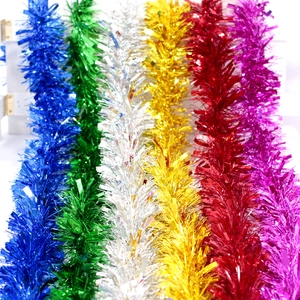 Vertical display of colorful metallic foil pull bows for festive Christmas gift packaging