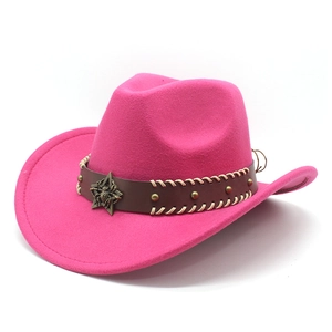 Detail of hot pink felt cowboy hat with leather band and bronze star emblem