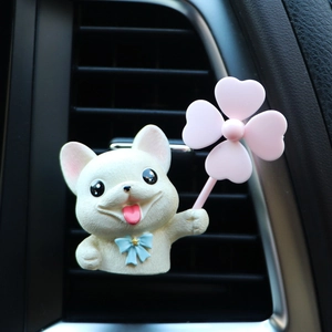 Cute white puppy car vent clip air freshener with blue bowtie and pink clover windmill