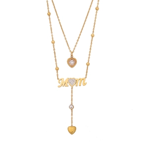 Double-layered gold MOM heart necklace with crystal pendants on white background