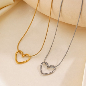 Chic 18K gold plated heart pendant necklace set with sleek snake chains on satin