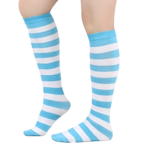 Close-up of blue and white striped knee-high socks with ribbed cuffs on model legs