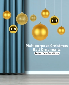 Golden Christmas balls in shiny, matte, and glitter finishes hanging on blue background