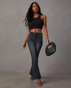 Chic outfit with high-waist charcoal flare jeans and black ribbed crop tank top
