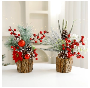 Detailed view of mini Christmas trees with pine cones, red berries, and bark bases