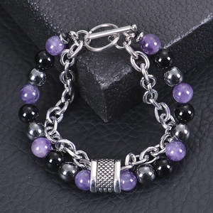 Detail of double-layer bracelet with natural stone beads, metal chain, and T-bar clasp