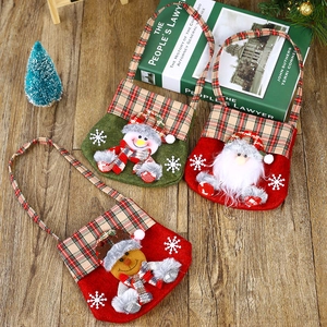 Three non-woven Christmas gift bags featuring 3D Santa, Snowman and Reindeer characters