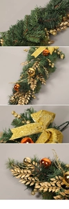 Detailed close-up of golden Christmas pine swag with PVC needles and glitter ornaments