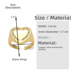 Detail of gold heart ring showing 1.6cm width and cubic zirconia paved borders