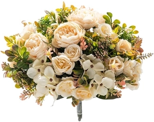 Artificial ranunculus and rose bouquet in champagne cream for home or wedding decor