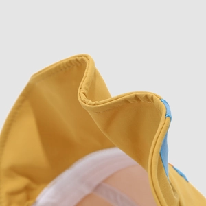 Detailed stitching and mesh lining on the brim of a yellow toddler sun hat
