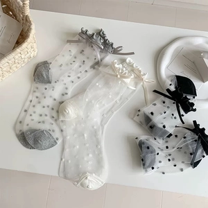 Chaussettes en tulle transparent à pois avec volants et nœuds en ruban élégants