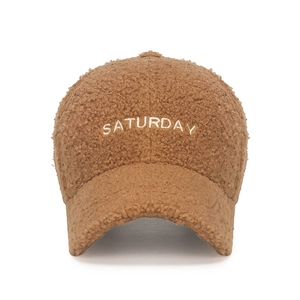 Caramel brown fuzzy teddy wool baseball cap with white Saturday embroidery on front