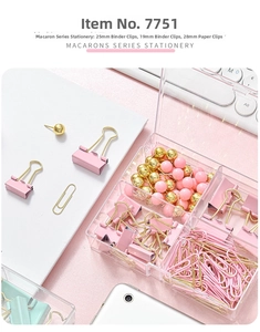 Pink and gold stationery set including paper clips and binder clips in a storage box