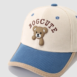 Kids corduroy baseball cap with cartoon bear patch and blue contrast brim