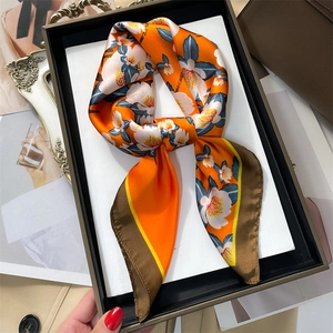 Elegant 70cm silk scarf with floral print and orange base in a premium gift display box