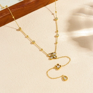 Gold plated stainless steel Y-necklace with butterfly, rose and teardrop crystal pendants