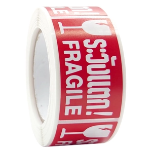 Red fragile warning sticker roll with white text and glass icon for shipping