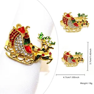 Golden Santa sleigh and reindeer napkin ring with colorful rhinestones for Christmas decor