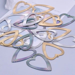 Polished 18k gold heart charms with ribbed texture for DIY jewelry making