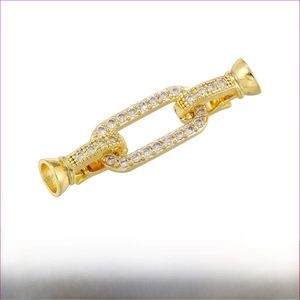 Detail of 18K gold plated brass connector clasp set with sparkling cubic zirconia stones
