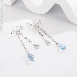S999 silver butterfly earrings with moonstone and light blue teardrop stone pendants