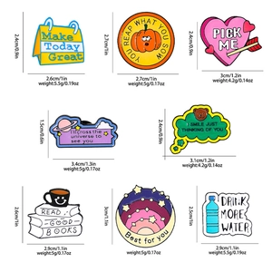 Detail view of enamel pins set with exact size and weight measurements in centimeters