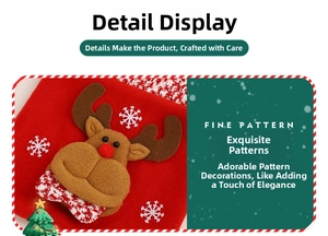 Detail of Christmas candy bag featuring a 3D plush reindeer and snowflake embroidery