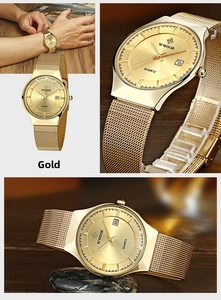 Close-up of gold men's quartz watch showing sunray dial, calendar window and mesh strap