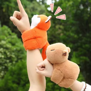 Cute plush animal slap bracelets featuring a stuffed fox and capybara for kids
