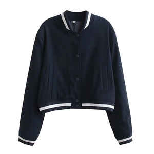 Detailed flat lay of a navy blue baseball jacket with striped ribbing and snap buttons